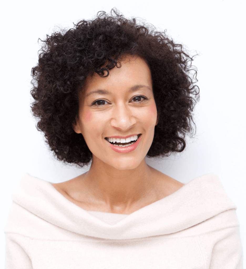 Woman smiling after a CoolSculpting appointment